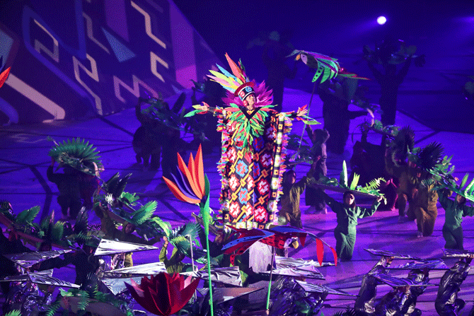 Performers dance during the Pan American Games opening ceremony at Estadio Nacional on July 26