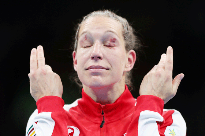 Canada's Myriam Da Silva reacts to winning silver in the women's Welter 64-69kg boxing final on August 1