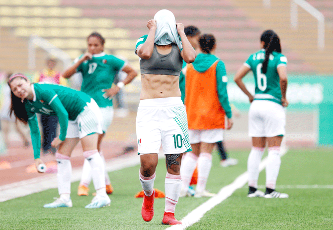 Mexico's Sandra S. Mayor Gutierrez is dejection after their First Round Group A football match against Colombia at San Marcos Stadium on August 3