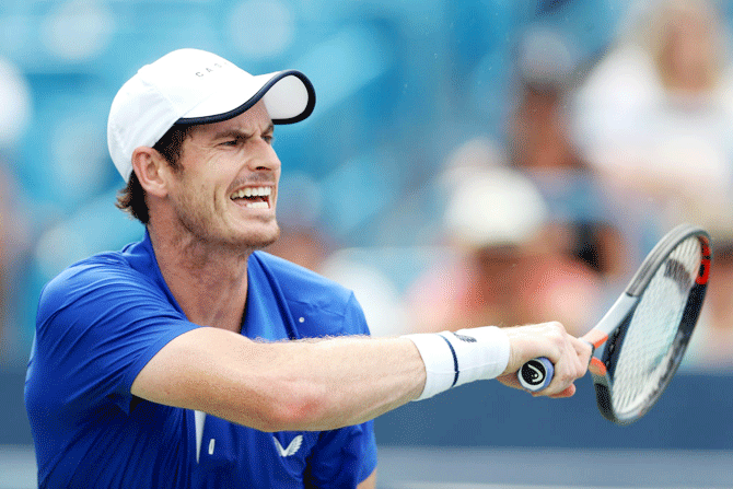 Great Britain's Andy Murray returns a shot to France's Richard Gasquet during Day 3 of the Western and Southern Open, Cincinnati Masters at Lindner Family Tennis Center in Mason, Ohio, on Monday