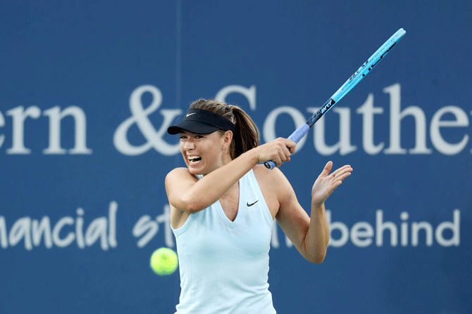 Russia's Maria Sharapova returns a shot to United States' Alison Riske during Day 3 of the Western and Southern Open, Cincinnati Masters at Lindner Family Tennis Center in Mason, Ohio, on Monday