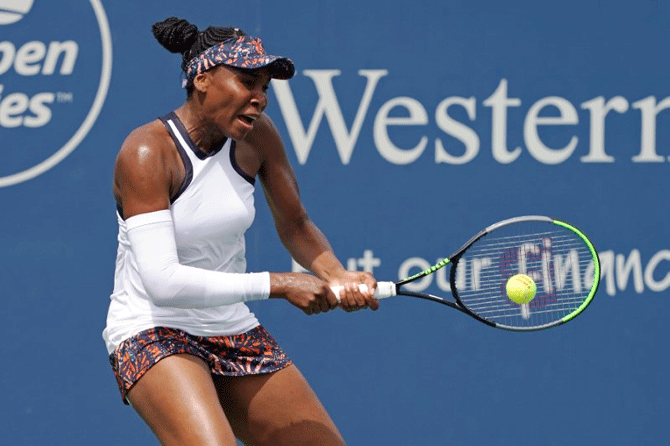 USA's Venus Williams in action against The Netherlands' Kiki Bertens during the Western and Southern Open tennis tournament, Cincinnati Masters at Lindner Family Tennis Center in Mason, Ohio on Tuesday