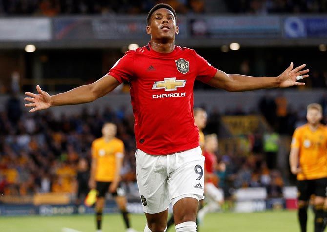 Anthony Martial celebrates scoring the goal for Manchester United during the match against Wolverhampton Wanderers on Monday