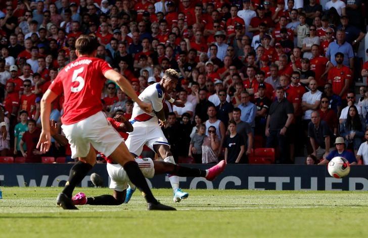 Crystal Palace's Patrick van Aanholt scores