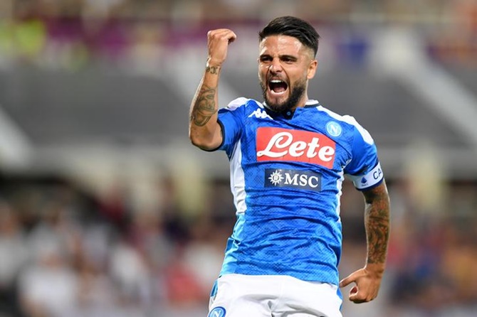 Lorenzo Insigne celebrates after scoring Napoli's second goal in the Serie A match against Fiorentina.