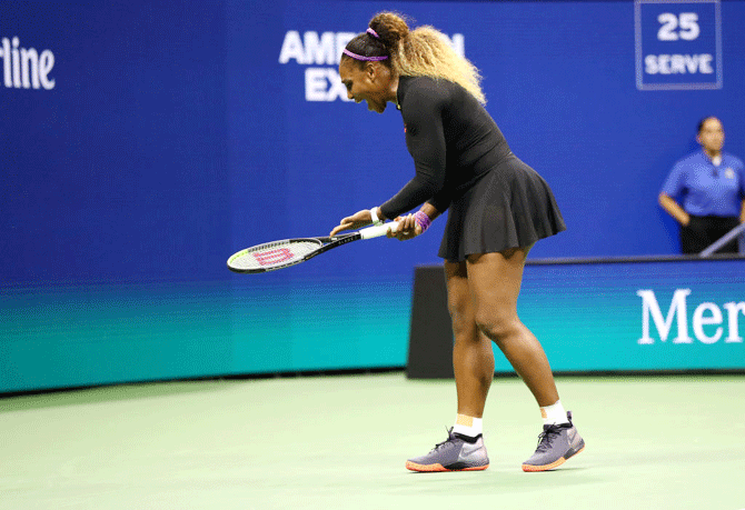 Serena Williams shows her frustration during her error-prone first set