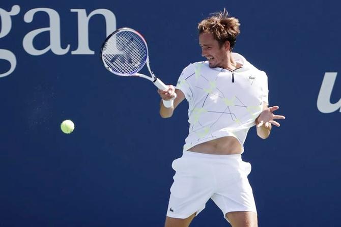 Daniil Medvedev hits a forehand against Hugo Dellien.