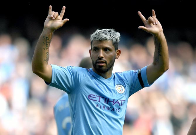 Sergio Aguero celebrates scoring Manchester City's third goal