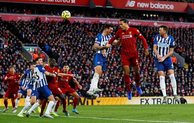 Virgil van Dijk scores Liverpool's second goal in Saturday's Premier League match against Brighton & Hove Albion