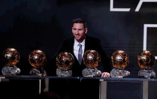 Lionel Messi with his six Ballon d'Or trophies.