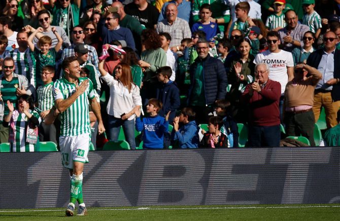 Real Betis' Joaquin Sanchez celebrates on completing his hat-trick against Athletic Bilbao on Sunday