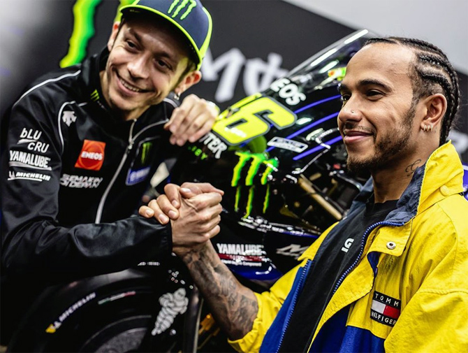 PIX: Hamilton and Rossi preparing for ride swap - Rediff