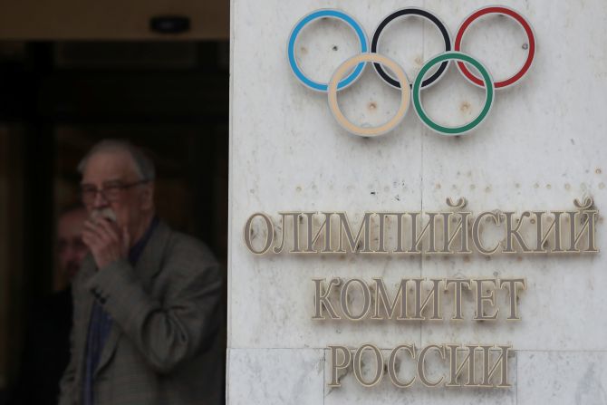 People gather outside the headquarters of the Olympic Committee of Russia in Moscow, Russia on November 28