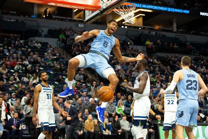 Memphis Grizzlies forward Bruno Caboclo (5) dunks the ball during the third quarter of their NBA match against the Minnesota Timberwolves at Target Center in Minneapolis, Minnesota, on Sunday, December 1.