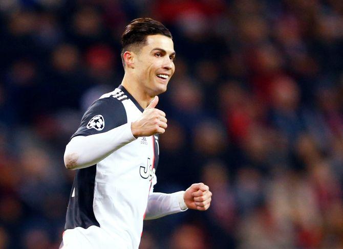 Juventus' Cristiano Ronaldo celebrates after scoring against Bayer Leverkusen in their Champions League Group D match at BayArena in Leverkusen, Germany