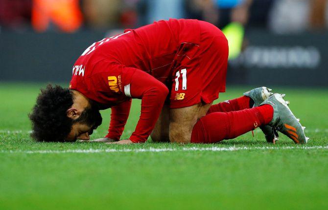 Liverpool's Mohamed Salah celebrates scoring their second goal against Watford at Anfield in Liverpool