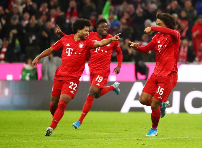 Bayern Munich's Serge Gnabry celebrates with teammates after scoring their second goal against VfL Wolfsburg at Allianz Arena in Munich on Saturday