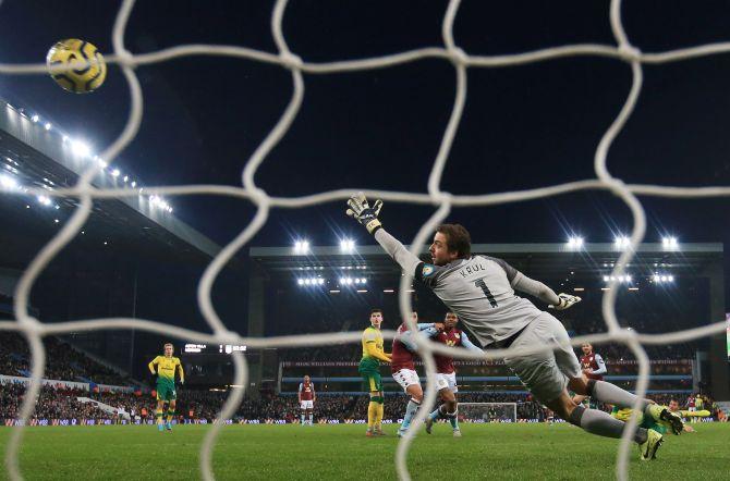 Aston Villa's Conor Hourihane scores their first goal against Norwich City at Villa Park in Birmingham