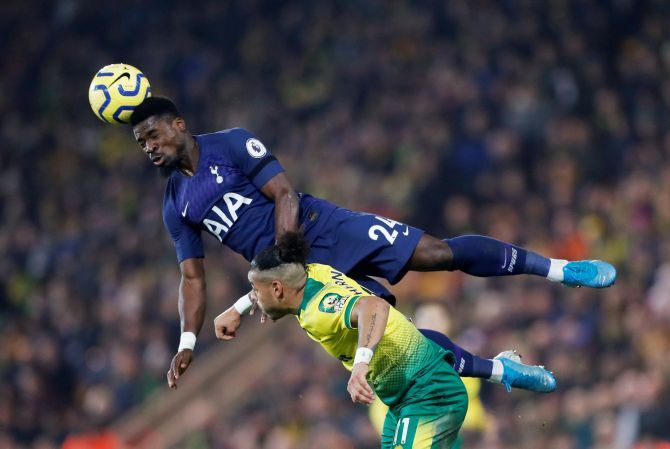 Tottenham Hotspur's Serge Aurier and Norwich City's Onel Hernandez in an aeriel challenge