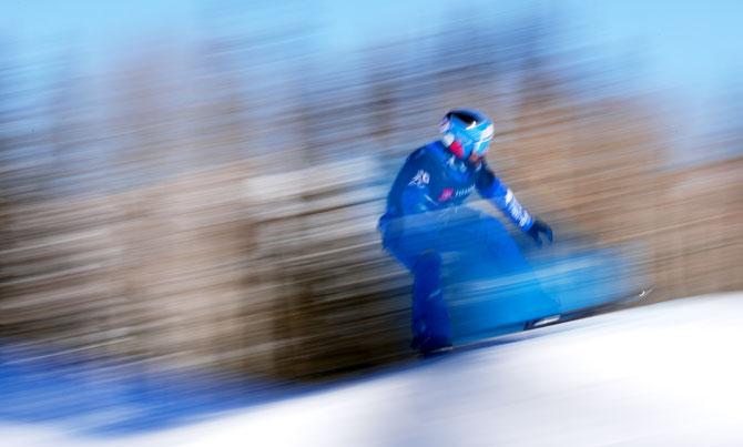 Italy's Fabio Cordi competes during the Men's Snowboard Cross Qualifier at the FIS Snowboard World Championships on Thursday