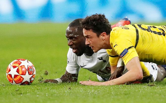 Borussia Dortmund's Thomas Delaney and Tottenham's Moussa Sissoko in action during their Champions League Round of 16 first leg match 