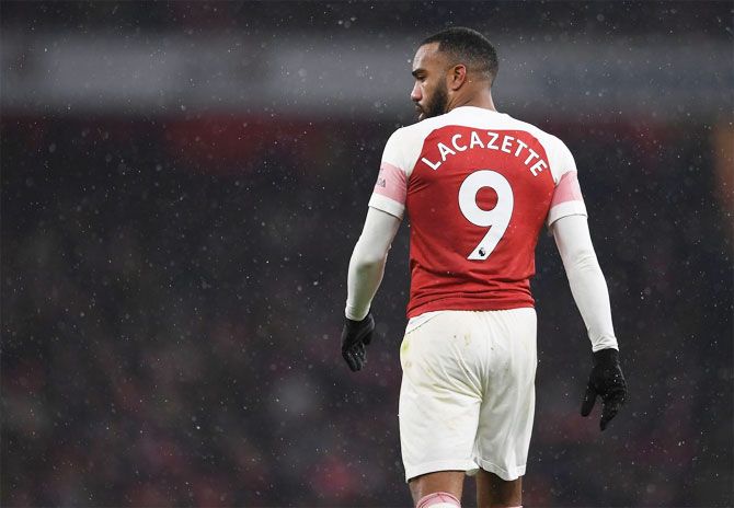Arsenal forward Alexandre Lacazette walks out after receiving a red card during the Europa League match against BATE Borisov on Thursday