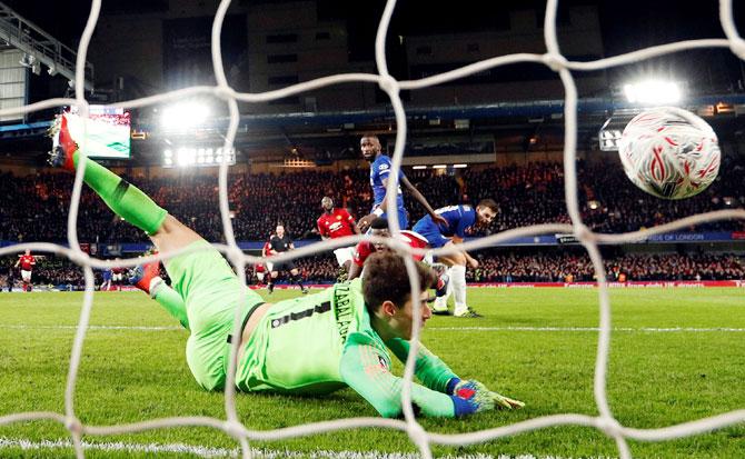 Manchester United's Paul Pogba scores