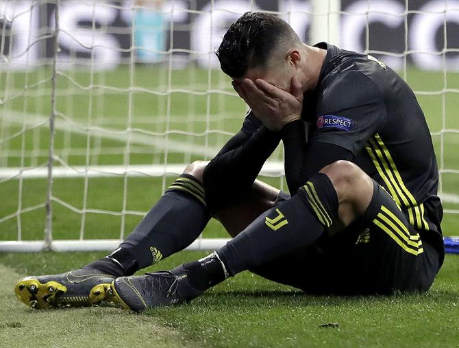 Cristiano Ronaldo reacts after missing a chance during their Champions League last-16 tie against Juventus on Wednesday, February 20