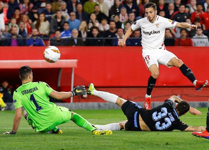 Sevilla's Pablo Sarabia (left) scores their second goal against Lazio in their Champions League Round of 32 match on Wednesday, February 20