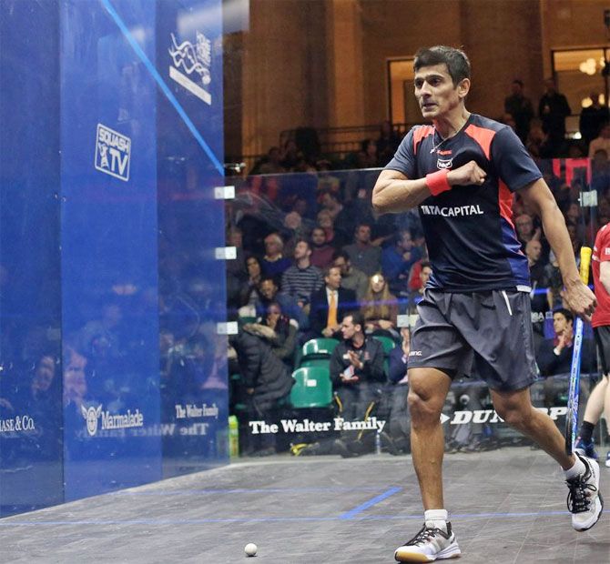 India's Saurav Ghosal celebrates on winning his match to move into the quarter-finals of the Squash World Championships