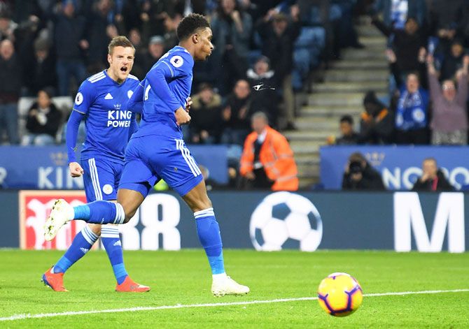 Leicester City's Demarai Gray (left) celebrates with team mate Jamie Vardy as he scores his team's first goal against Leicester City and Brighton & Hove Albion at The King Power Stadium in Leicester