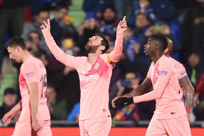 FC Barcelona's Lionel Messi celebrates after scoring his team's opening goal against Getafe CF durng their La Liga match at Coliseum Alfonso Perez in Getafe, Spain, on Sunday