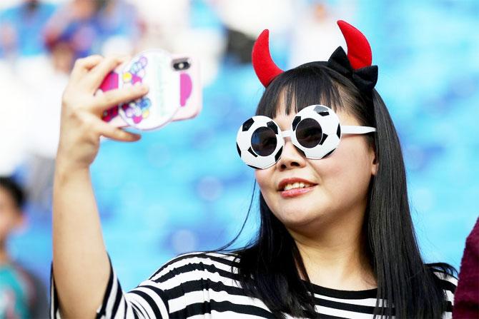 A South Korea fans clicks a selfie 