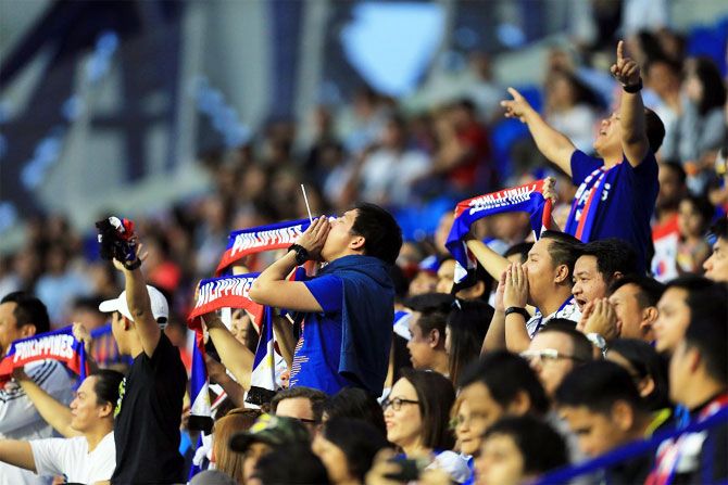 A group of Philippines fans egg their team on as they doggedly defended in their 1-0 loss against South Korea