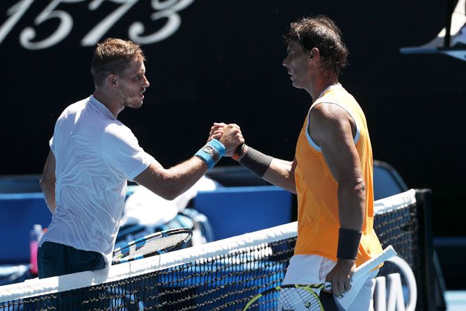 Spain's Rafael Nadal is congratulated by Australia's James Duckworth after winning the match