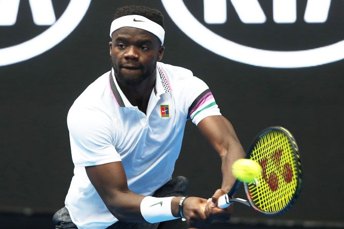 USA's Frances Tiafoe reurns against South Africa's Kevin Anderson