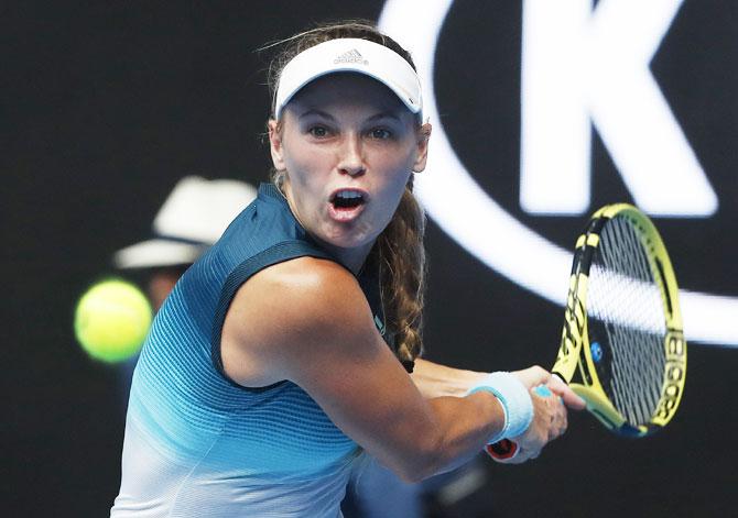 Denmark's Caroline Wozniacki in action during Her match against Sweden's Johanna Larsson