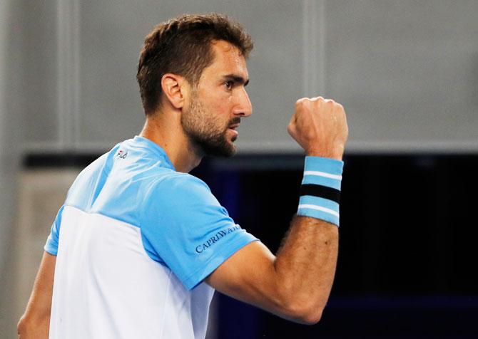 Croatia's Marin Cilic reacts after winning a point during the match against Spain's Fernando Verdasco