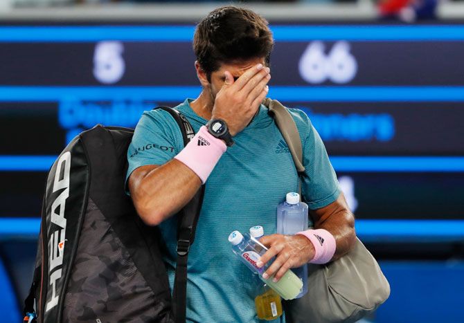 Spain's Fernando Verdasco looks dejected after losing the match against Croatia's Marin Cilic