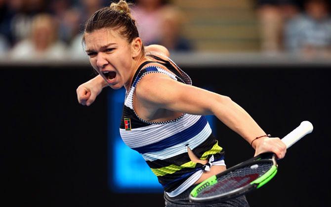 Simona Halep celebrates winning a point in her third round match against Venus Williams on Saturday