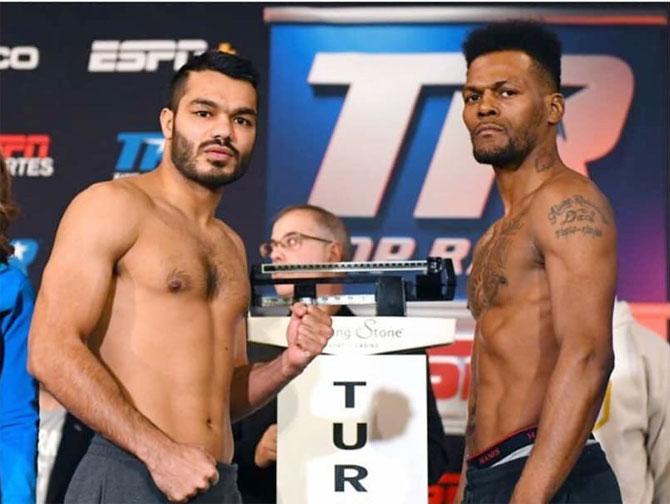 India's Vikas Krishan (left) beat American Steven Andrade in his pro boxing debut on Friday