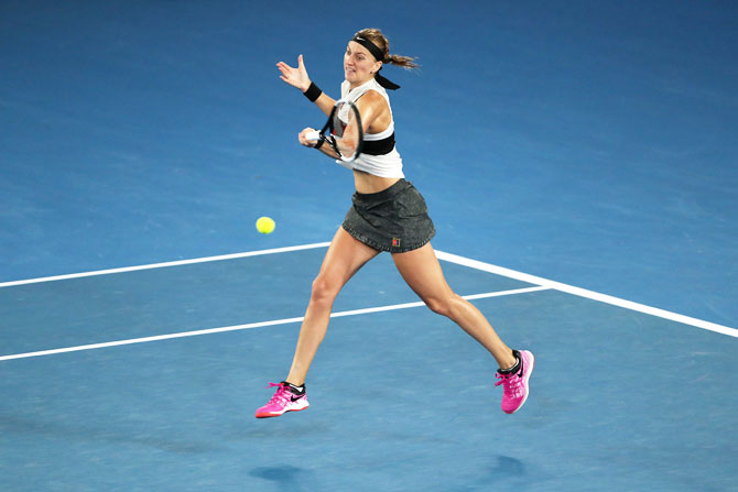 Petra Kvitova makes a forehand return against Danielle Collins