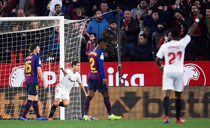 Sevilla FC's Wissam Ben Yedder celebrates after scoring his team's second goal against FC Barcelona during the Copa del first leg quarter-final match at Estadio Ramon Sanchez Pizjuan in Seville, on Wednesday.