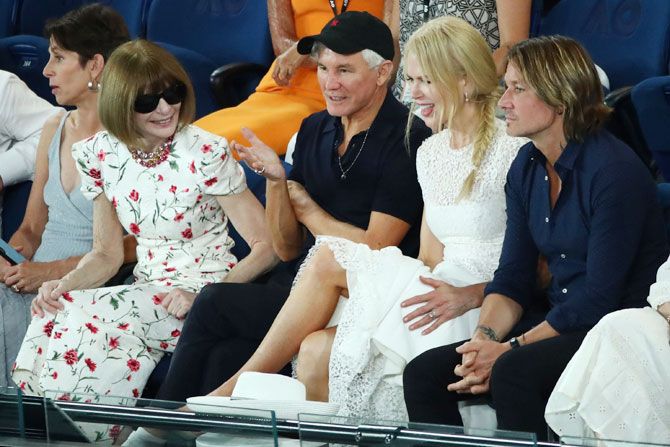 Anna Wintour, editor-in-chief of Vogue magazine chats with Baz Luhrmann, Nicole Kidman and Keith Urban on Thursday