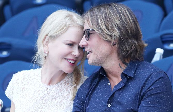 Hollywood's Australian superstar Nicole Kidman and her singer-songwriter husband Keith Urban at the Women's semi-final match between Petra Kvitova and Danielle Collins on Thursday