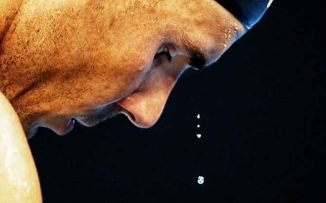 Sweat drips from the brow of Rafael Nadal during his men's singles semi-final against Greece’s Stefanos Tsitsipas on Thursday