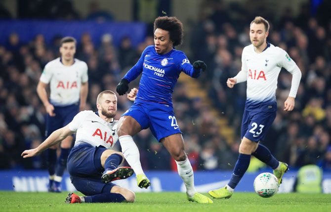 Chelsea's Willian is tackled by Tottenham Hotspu's Eric Dier
