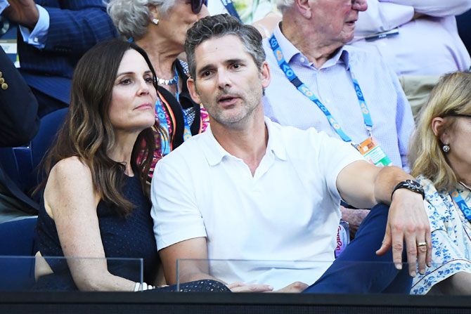Hollywood's Australian actor Eric Bana and his wife Rebecca Gleeson watch the men's semi-final between Serbia's Novak Djokovic and France's Lucas Pouille on Friday