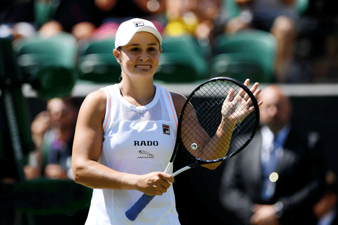 Australia's Ashleigh Barty celebrates defeating Belgium's Alison Van Uytvanck in their 2nd round match