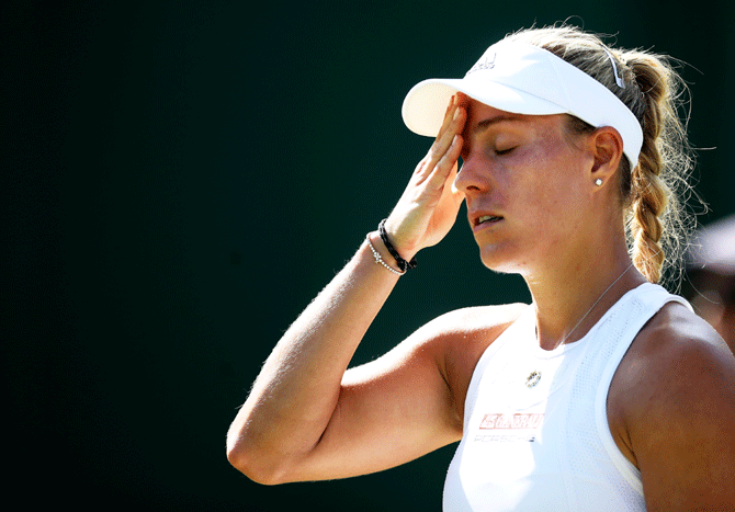 Germany's Angelique Kerber wears a worried look during her second round match against USA's Lauren Davis 